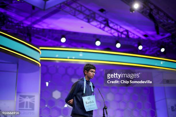 Karthik Nemmani correctly spells the word 'koinonia' to win the 91st Scripps National Spelling Bee at the Gaylord National Resort and Convention...