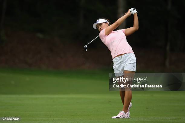 Jin Young Ko of South Korea plays her second shot on the 11th hole during the first round of the 2018 U.S. Women's Open at Shoal Creek on May 31,...