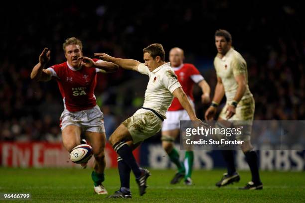 Andy Powell of Wales attempts to charge down Jonny Wilkinson of England during the RBS 6 Nations Championship match between England and Wales at...
