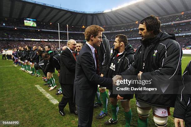 His Royal Highness Prince Harry meetsJonathan Thomas and other members of the Welsh team as he attends the RBS 6 Nations Championship match between...