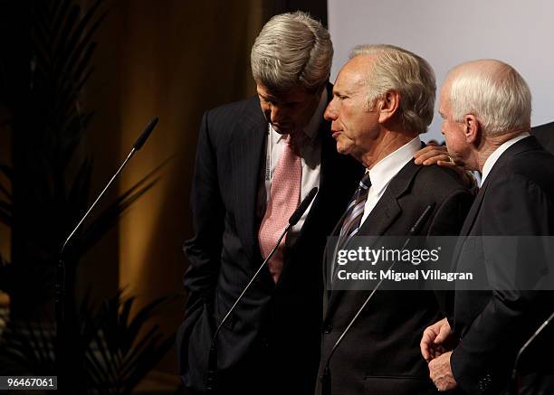 Senators John Kerry, Joseph Lieberman and John McCain give a press statement on the second day of the 46th Munich Security Conference at the...