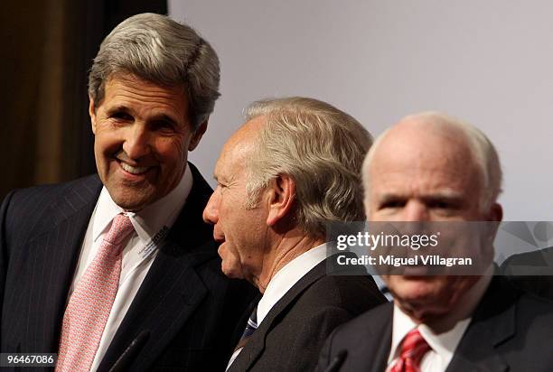 Senators John Kerry, Joseph Lieberman and John McCain give a press statement on the second day of the 46th Munich Security Conference at the...