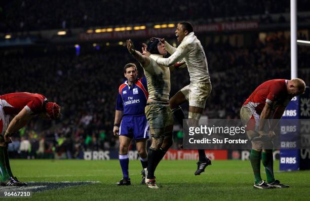 James Haskell of England celebrates with team mate Delon Armitage after scoring during the RBS 6 Nations Championship match between England and Wales...