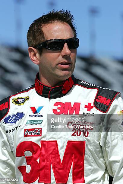 Greg Biffle, driver of the 3M Ford, walks on pit road during qualifying for the Daytona 500 at Daytona International Speedway on February 6, 2010 in...