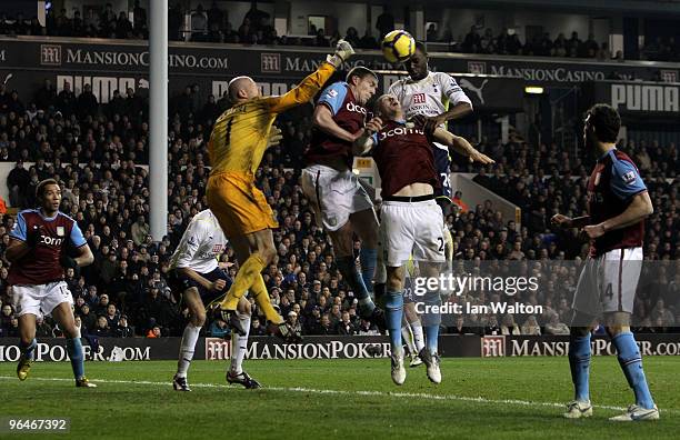Ledley King of Tottenham Hotspur attempts a header towards the Aston Villa goal during the Barclays Premier League match between Tottenham Hotspur...