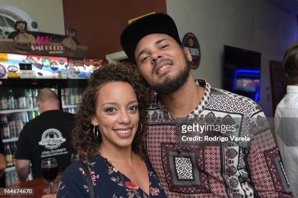 Jalissa Winston and Walshy Fire pose at the Reggae Music Member Mixer on May 31, 2018 in Lauderhill, Florida.