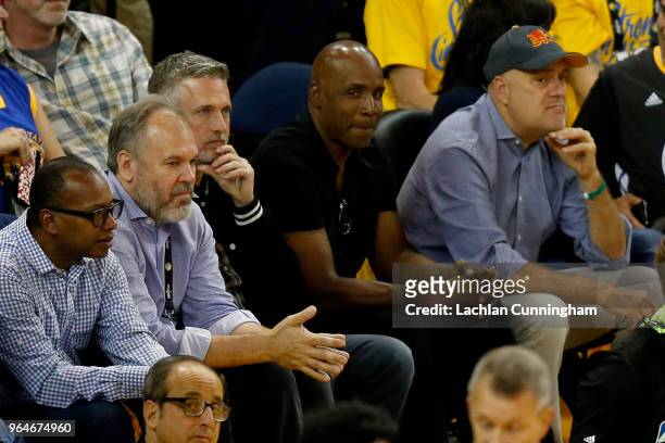 Bill Simmons of The Ringer and Barry Bonds watch Game 1 of the 2018 NBA Finals at ORACLE Arena on May 31, 2018 in Oakland, California. NOTE TO USER:...