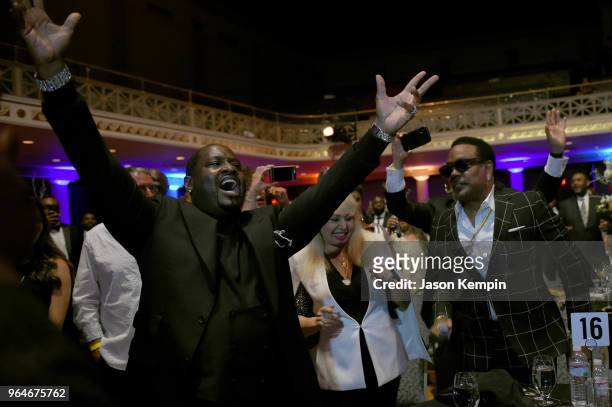 Singer-songwriter Johnny Gill performs in the crowd next to Mahin Wilson and musician Charlie Wilson during NMAAM Celebration of Legends Galaon May...