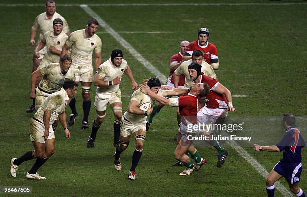 James Haskell of England pushes Gareth Cooper of Wales during the RBS 6 Nations match between England and Wales at Twickenham Stadium on February 6,...