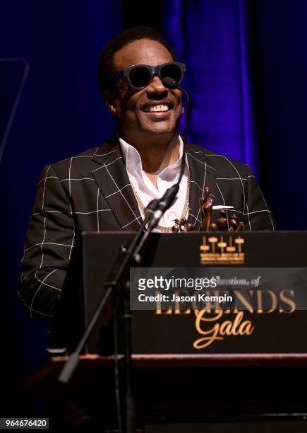 Musician Charlie Wilson accepts an award onstage during NMAAM Celebration of Legends Galaon May 31, 2018 in Nashville, Tennessee.