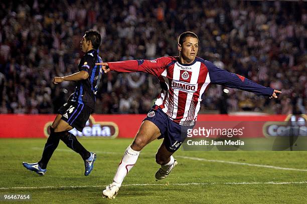 Chivas' player Javier Hernandez celebrates his scoared goal against Queretaro during their match as part of the 2010 Bicentenary Tournament in the...