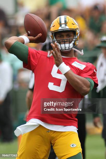 Green Bay Packers quarterback DeShone Kizer throws a pass during Green Bay Packers Organized Team Activities at Ray Nitschke Field on May 31, 2018 in...