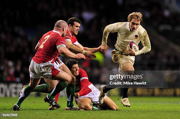 Mathew Tait of England breaks through the Welsh defence during the RBS 6 Nations Championship match between England and Wales at Twickenham Stadium...