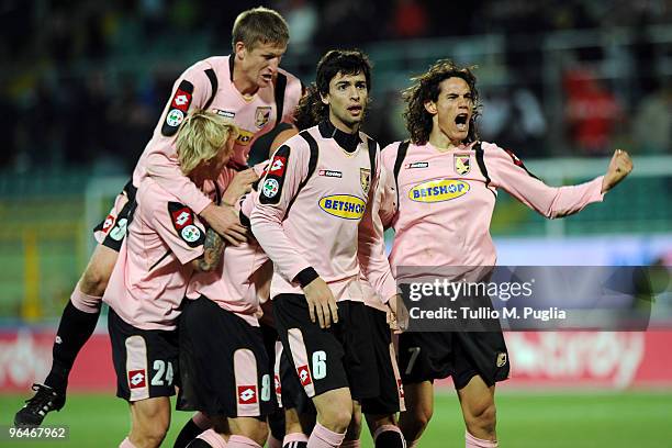 Players of Palermo celebrate Fabio Simplicio's goal during the Serie A match between Palermo and Parma at Stadio Renzo Barbera on February 6, 2010 in...