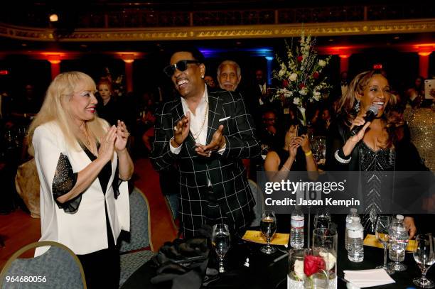 Artist Kathy Sledge performs in the crowd next to Mahin Wilson and musician Charlie Wilson during NMAAM Celebration of Legends Galaon May 31, 2018 in...