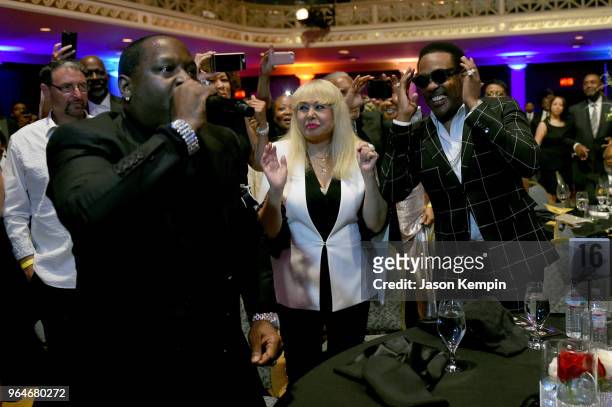 Singer-songwriter Johnny Gill performs in the crowd next to Mahin Wilson and musician Charlie Wilson during NMAAM Celebration of Legends Galaon May...