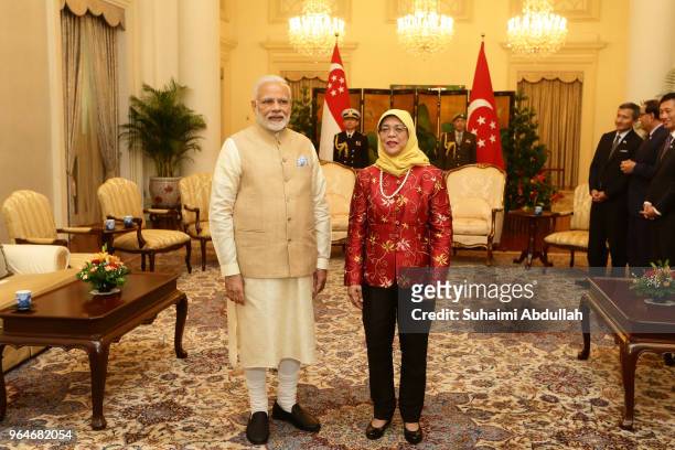 Indian Prime Minister Narendra Modi meets with Singapore President, Halimah Yacob at the Istana on June 1, 2018 in Singapore. Narendra Modi is on a...