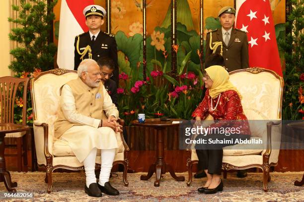 Indian Prime Minister Narendra Modi meets with Singapore President, Halimah Yacob at the Istana on June 1, 2018 in Singapore. Narendra Modi is on a...