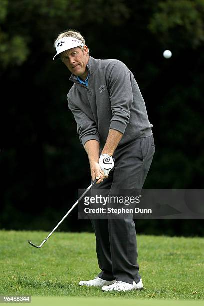 Stuart Appleby of Australia chips onto the 12th green during of the third round of the Northern Trust Open at Riviera Country Club on February 6,...