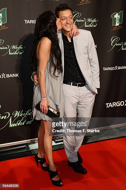Mesut Oezil and his girlfriend Anna Maria Lagerblom pose during the Werder Bremen Green White Night 2010 at the Congress Centre on February 6, 2010...