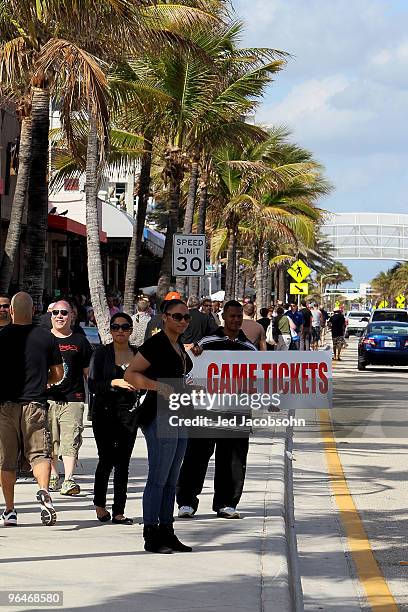 Fans walk along Fort Lauderdale Beach on February 6, 2010 in Fort Lauderdale, Florida. Super Bowl XLIV between the Indianapolis Colts and the New...