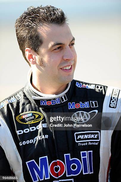 Sam Hornish Jr., driver of the Mobil 1 Dodge, walks on pit road during qualifying for the Daytona 500 at Daytona International Speedway on February...