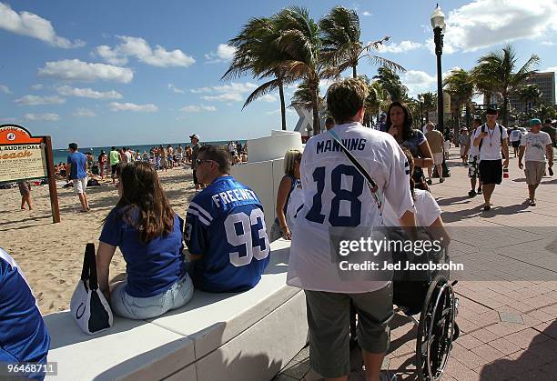 Colts fans walk along Fort Lauderdale Beach on February 6, 2010 in Fort Lauderdale, Florida. Super Bowl XLIV between the Indianapolis Colts and the...