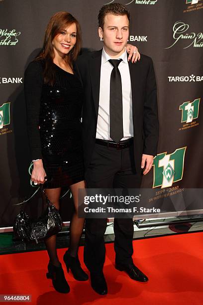 Philipp Bargfrede and his girlfriend Carola Mahnken pose during the Werder Bremen Green White Night 2010 at the Congress Centre on February 6, 2010...