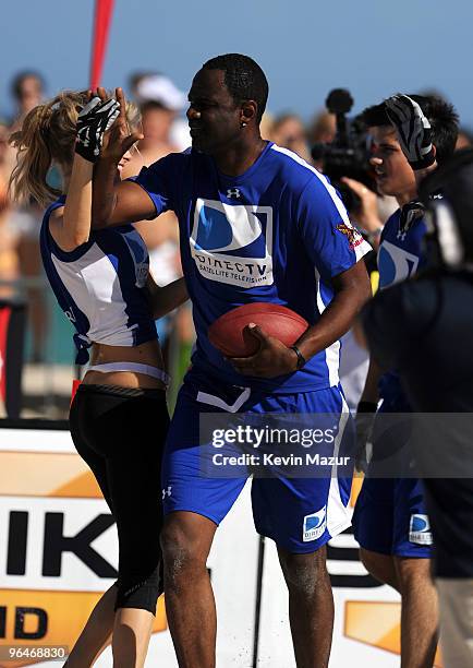 Model Marisa Miller and Singer Brian McKnight attend DIRECTV's 4th Annual Celebrity Beach Bowl on February 6, 2010 in Miami Beach, Florida.