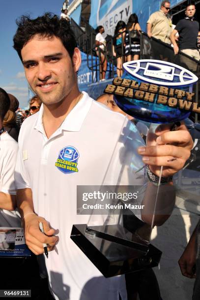 Mark Sanchez of the NY Jets with trophy for coaching at the Fourth Annual DIRECTV Celebrity Beach Bowl at DIRECTV Celebrity Beach Bowl Stadium: South...