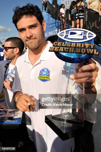 Mark Sanchez of the NY Jets with trophy for coaching at the Fourth Annual DIRECTV Celebrity Beach Bowl at DIRECTV Celebrity Beach Bowl Stadium: South...