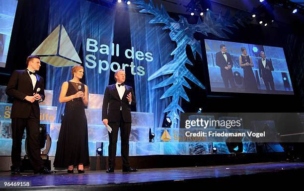 Paul Biedermann, Maria Riesch and Johannes B. Kerner present the 2009 Sports Gala 'Ball des Sports' at the Rhein-Main Hall on February 6, 2010 in...