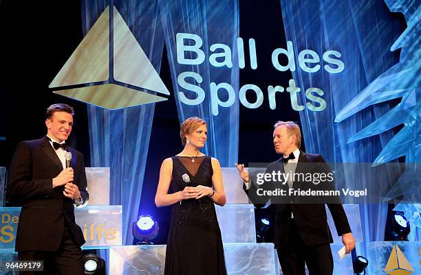 Paul Biedermann, Maria Riesch and Johannes B. Kerner present the 2009 Sports Gala 'Ball des Sports' at the Rhein-Main Hall on February 6, 2010 in...