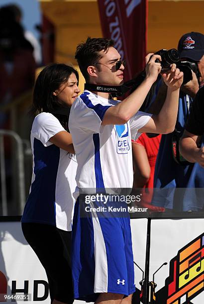 Actors Jessica Szohr and Ed Westwick attend the DIRECTV's 4th Annual Celebrity Beach Bowl on February 6, 2010 in Miami Beach, Florida.