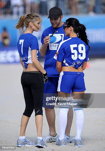 Marisa Miller, Kellan Lutz and Olivia Munn attend DIRECTV's 4th Annual Celebrity Beach Bowl on February 6, 2010 in Miami Beach, Florida.