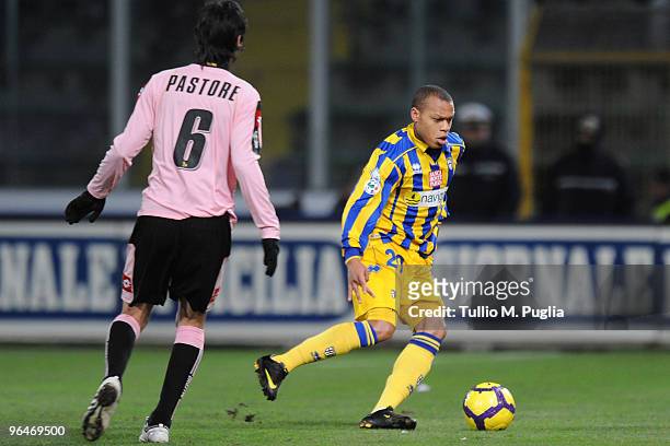 Jonathan Ludovic Biabiany of Parma holds off the challenge from Javier Pastore during the Serie A match between Palermo and Parma at Stadio Renzo...