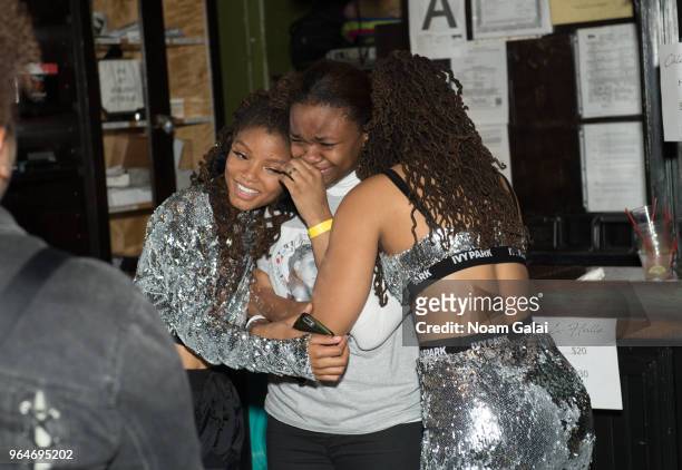 Halle Bailey and Chloe Bailey of Chloe x Halle meet a fan backstage at SOB's on May 31, 2018 in New York City.