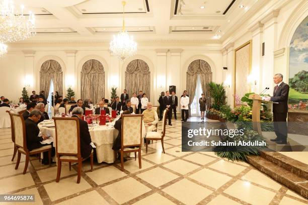 Singapore Prime Minister, Lee Hsien Loong speaks during an official lunch function as Indian Prime Minister Narendra Modi looks on at the Istana on...