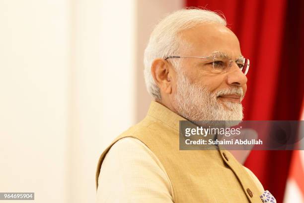Indian Prime Minister Narendra Modi arrives for the joint press conference at the Istana on June 1, 2018 in Singapore. Narendra Modi is on a three...