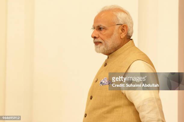 Indian Prime Minister Narendra Modi leaves after a joint press conference at the Istana on June 1, 2018 in Singapore. Narendra Modi is on a three day...