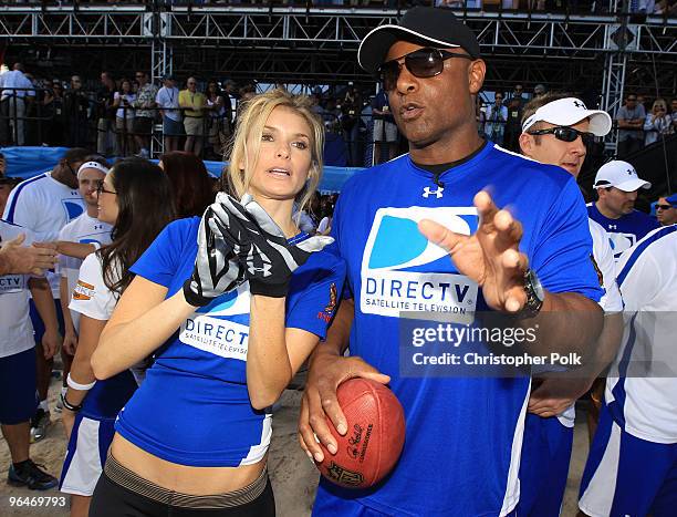 Model Marisa Miller and former NFL player Warren Moon attend the Fourth Annual DIRECTV Celebrity Beach Bowl at DIRECTV Celebrity Beach Bowl Stadium:...