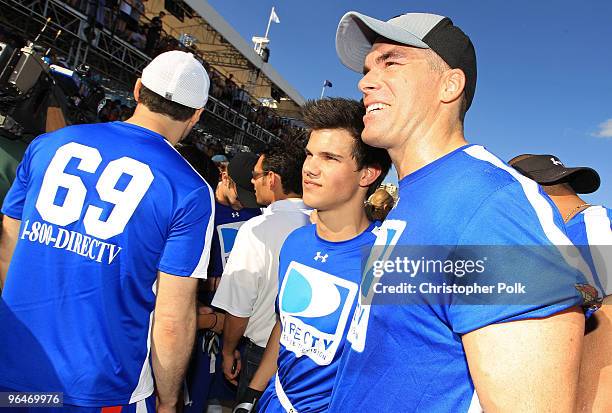 Taylor Lautner and Brandon Molale attend the Fourth Annual DIRECTV Celebrity Beach Bowl at DIRECTV Celebrity Beach Bowl Stadium: South Beach on...