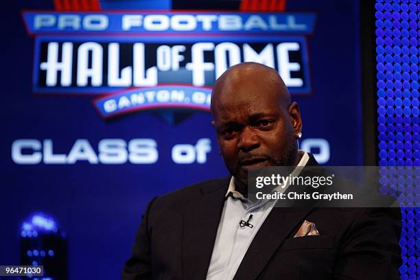 Emmitt Smith is overcome with emotion on stage after he was announced as one of the newest enhrinees into the Hall of Fame during the Pro Football...