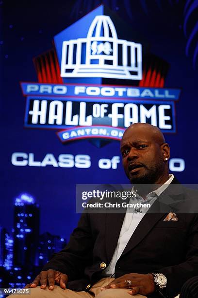 Emmitt Smith speaks on stage after he was announced as one of the newest enhrinees into the Hall of Fame during the Pro Football Hall of Fame Class...