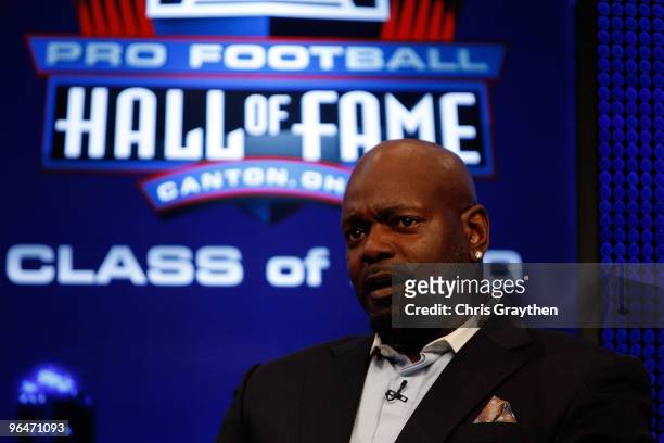 Emmitt Smith speaks on stage after he was announced as one of the newest enhrinees into the Hall of Fame during the Pro Football Hall of Fame Class...
