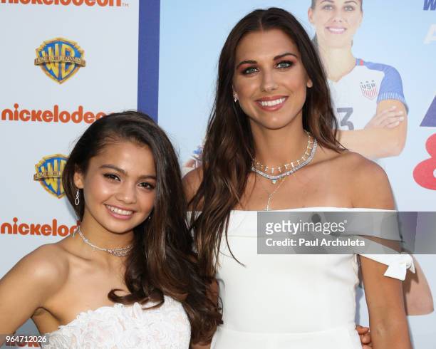 Actress Siena Agudong and Professional Soccer Player Alex Morgan attend the premiere of Warner Bros. Home Entertainment's "Alex & Me" at the...