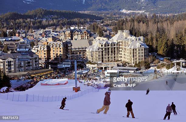 Skiers and snowboarders run down to Whistler Village ski resort on February 6, 2010.The owners of Whistler resort, Intrawest holdings, which will...