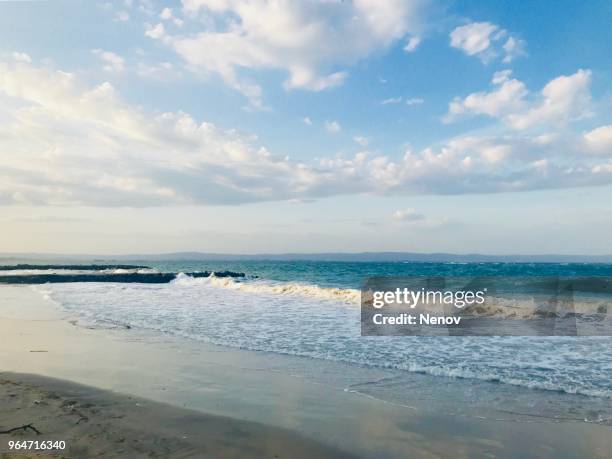 scenic view of beach against sky - pomorie stock-fotos und bilder