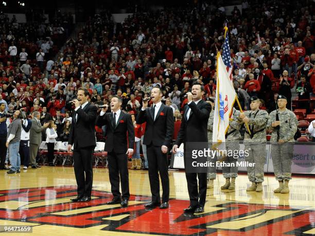 Toby Allen, Michael Tierney, Andrew Tierney and Phil Burton of the Australian vocal group Human Nature sing the American national anthem before a...