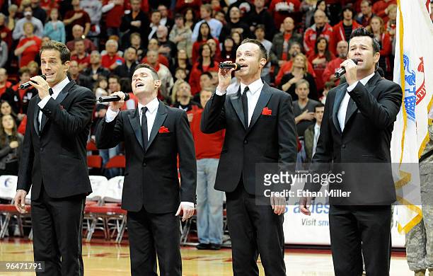 Toby Allen, Michael Tierney, Andrew Tierney and Phil Burton of the Australian vocal group Human Nature sing the American national anthem before a...